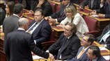 Ο πρόεδρος του ΠΑΣΟΚ Γιώργος Παπανδρέου και πρόεδρος του ΛΑ.ΟΣ. Γιώργος Καρατζαφέρης ...