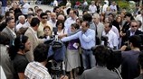Η γ.γ. του ΚΚΕ Αλέκα Παπαρήγα έξω από το εκλογικό τμήμα που ...