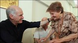 Ο πρόεδρος του ΠΑΣΟΚ Γιώργος Παπανδρέου συνομιλεί με ηλικιωμένους κατά την διάρκεια ...
