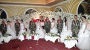 Ομαδική γαμήλια τελετή για τους στρατιωτες του Μπασάρ αλ-Άσαντ στη Χομς