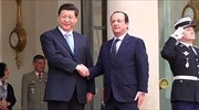 Γαλλία - Κίνα: Συμφωνίες δισεκατομμυρίων και αντιδράσεις στο Παρίσι