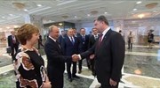 RT: Χειραψία Πούτιν - Πορoσένκο στο Μινσκ