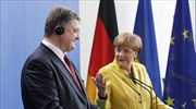 Μέρκελ: Ανοιχτό το ενδεχόμενο κυρώσεων κατά της Ρωσίας αλλά όχι τον Μάρτιο